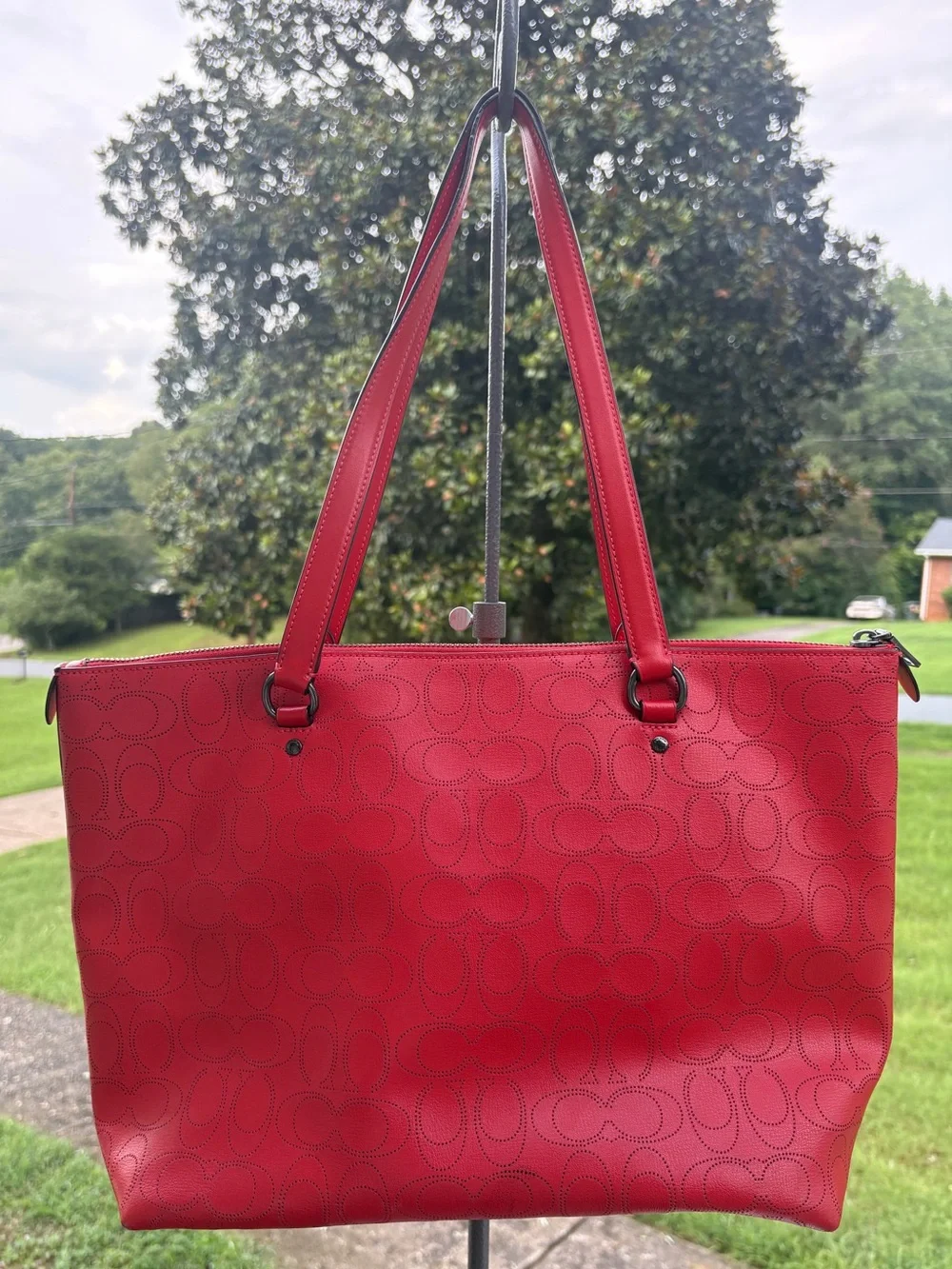 Coach red signature